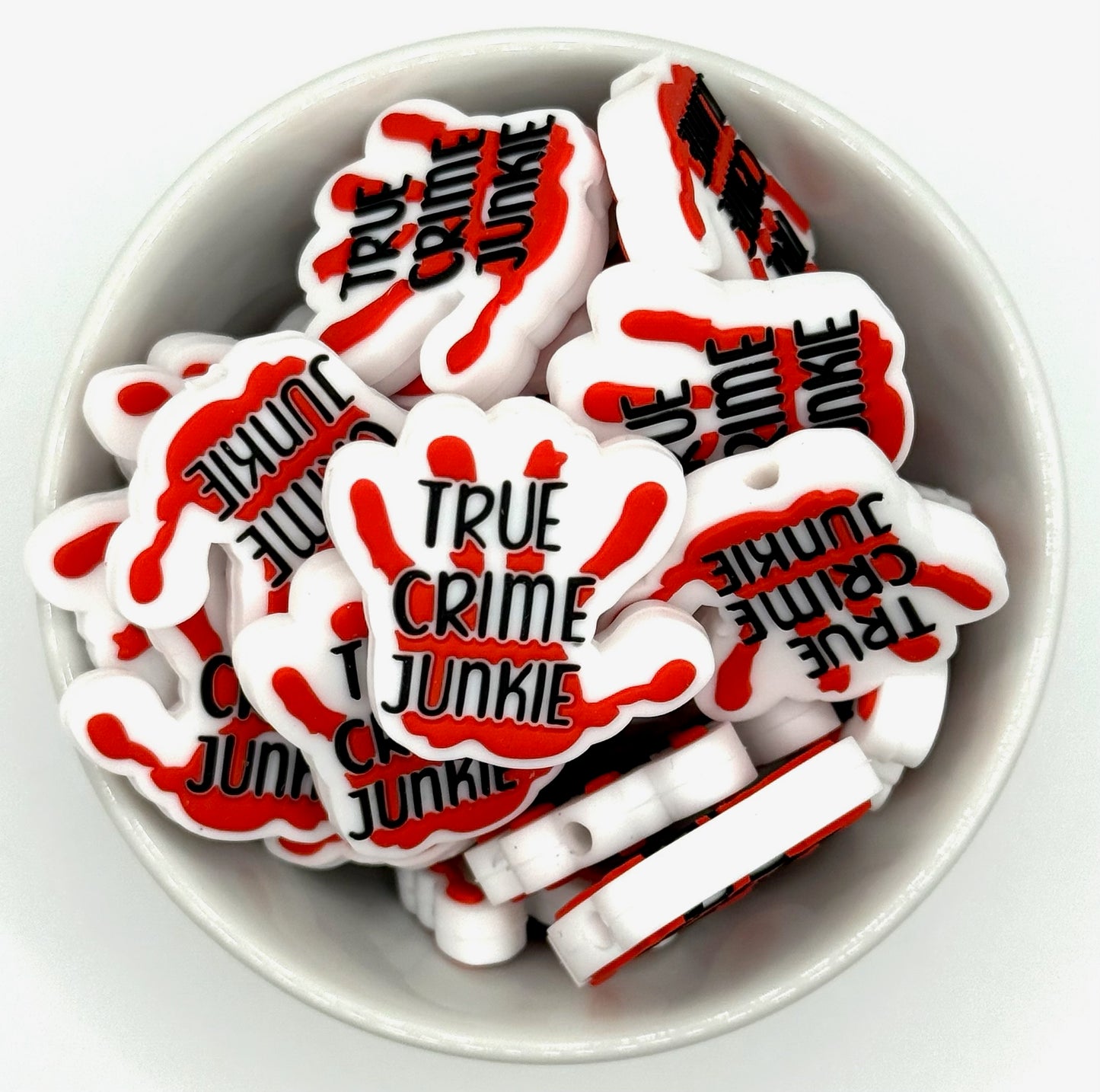 Accro au true crime | Perle focale en silicone